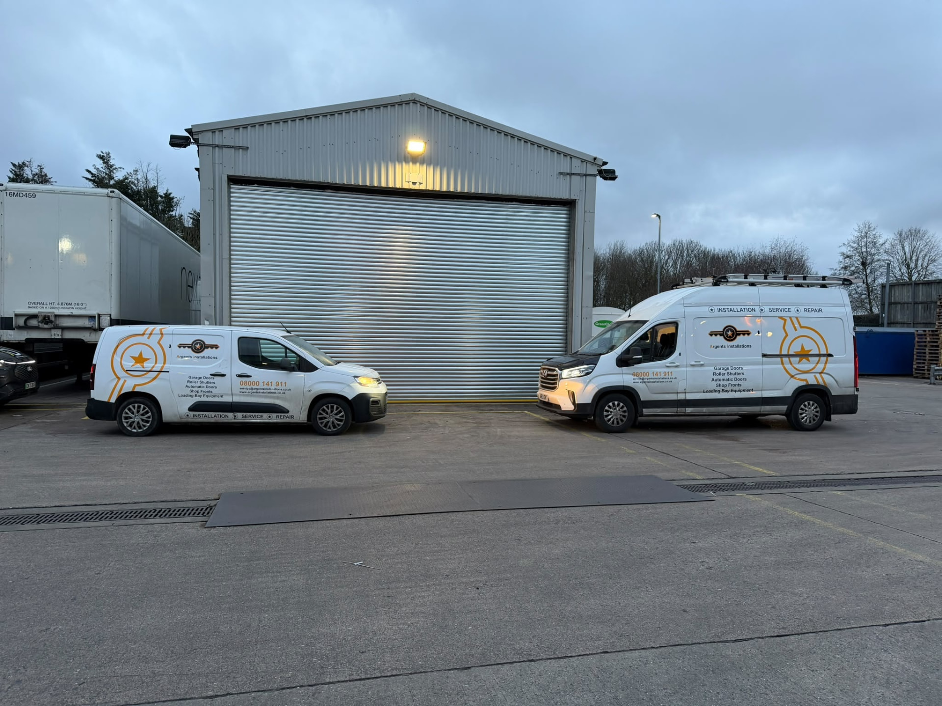 Argents Installations van on site at a roller shutter installation